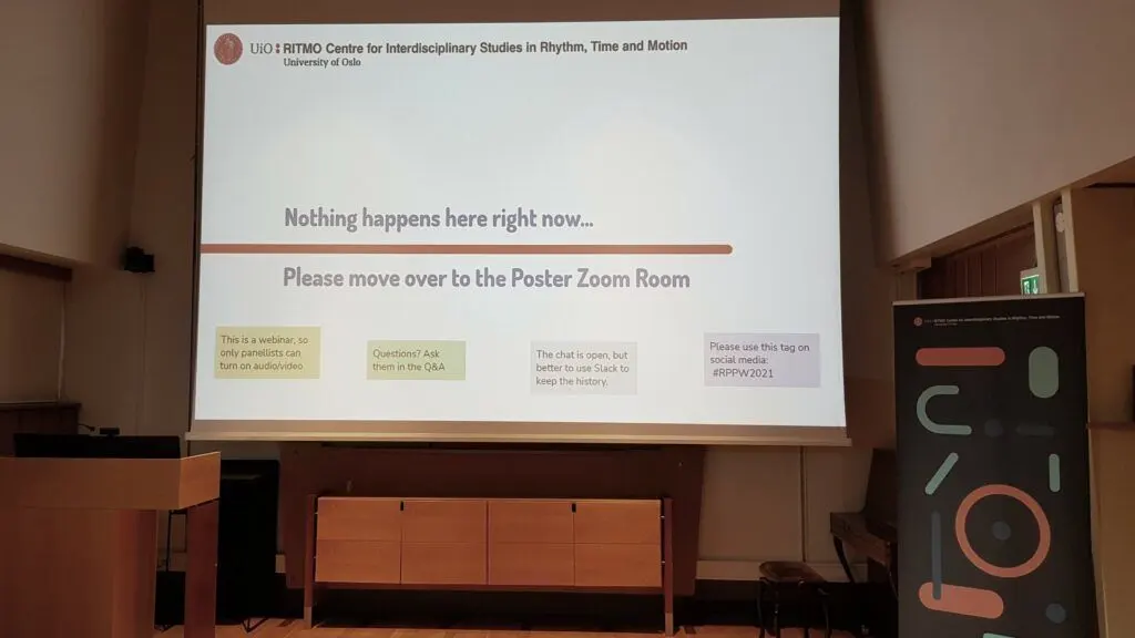 We displayed a &ldquo;waiting screen&rdquo; in the hall when there were activities elsewhere. This was visible to those that entered the Zoom Webinar by accident, guiding them to the right location.